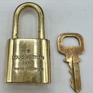 Vintage, authentic Louis Vuitton, padlock and key charm pendant working perfect
